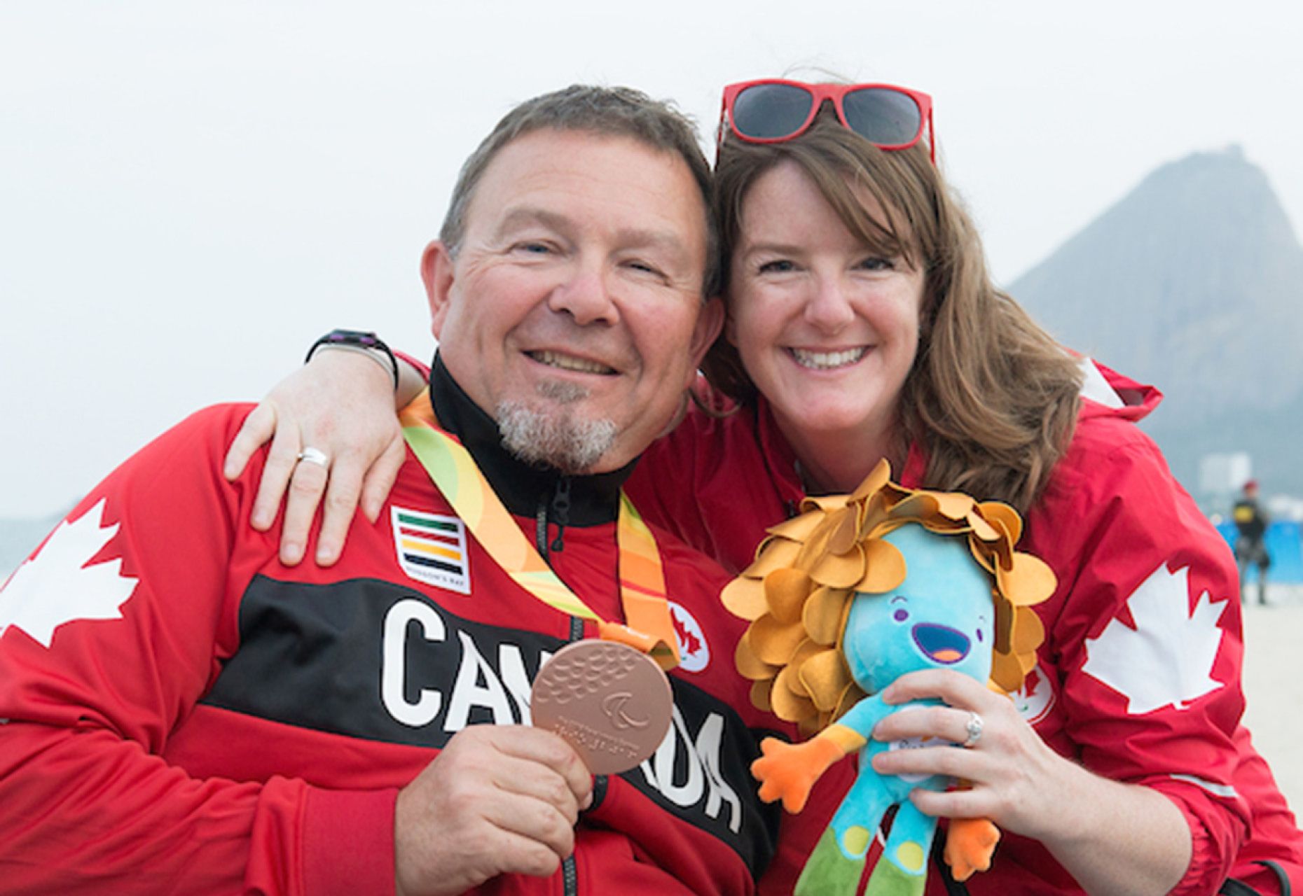 Headshots of Scott Lutes and Jenny Davey with Paralympic bronze medal