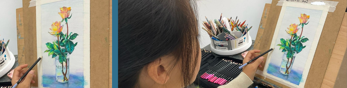 Teen student painting yellow roses at an easel in the Bedford art studio